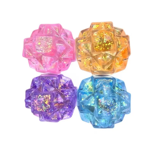 Balle anti-stress diamant pailletée tenue dans la main