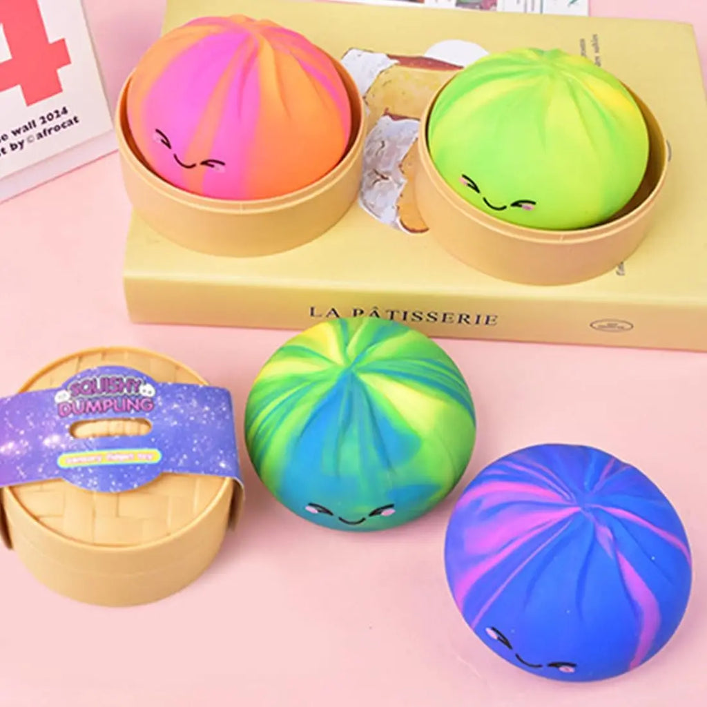 Squishy géant boîte mystère - boulette pailletée pressée entre les doigts
