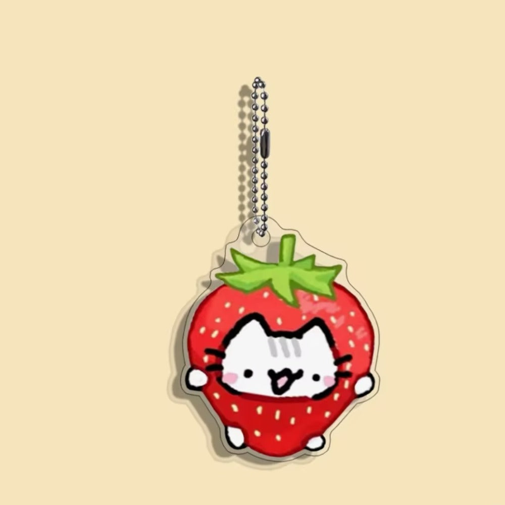 Porte-clés chat rigolo en acrylique, chat blotti dans une fraise